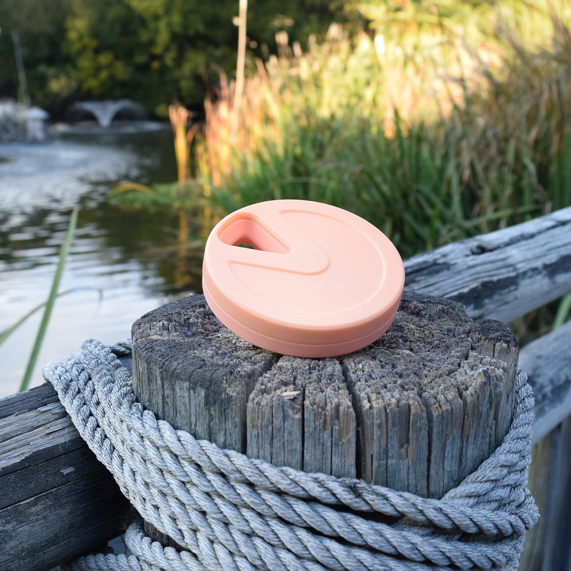 Peach Travel RX case with carabiner hole for clips and carry.