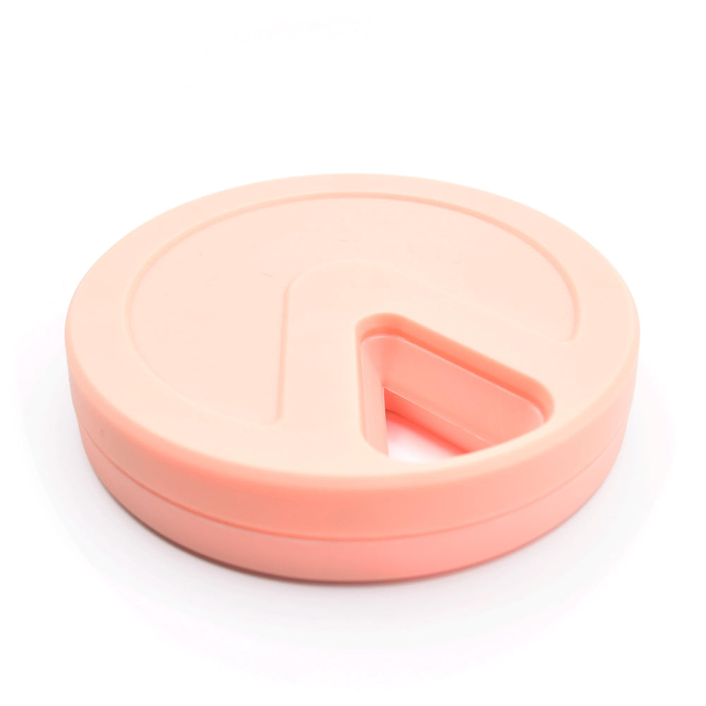 Type Two Labs Travel RX peach lid rotates for easy daily dosing.