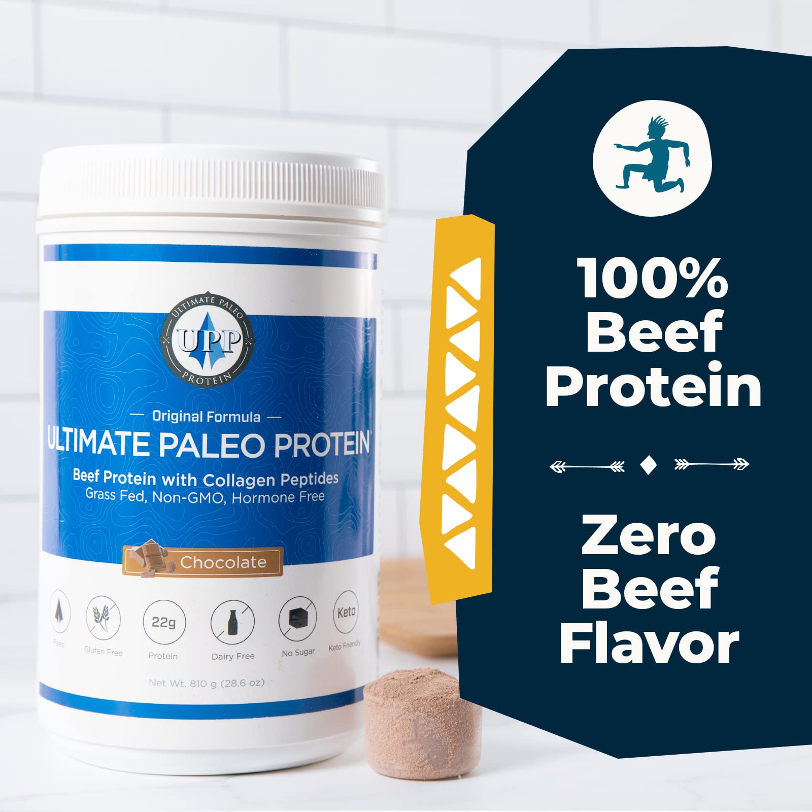 Ultimate Paleo Protein scoop with powder ready to mix into a shake.
