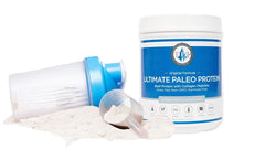 Ultimate Paleo Protein being poured into a glass for a smooth, dairy-free shake