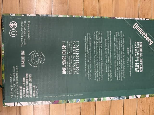 Underberg single-portion bottle on table ready after a meal.