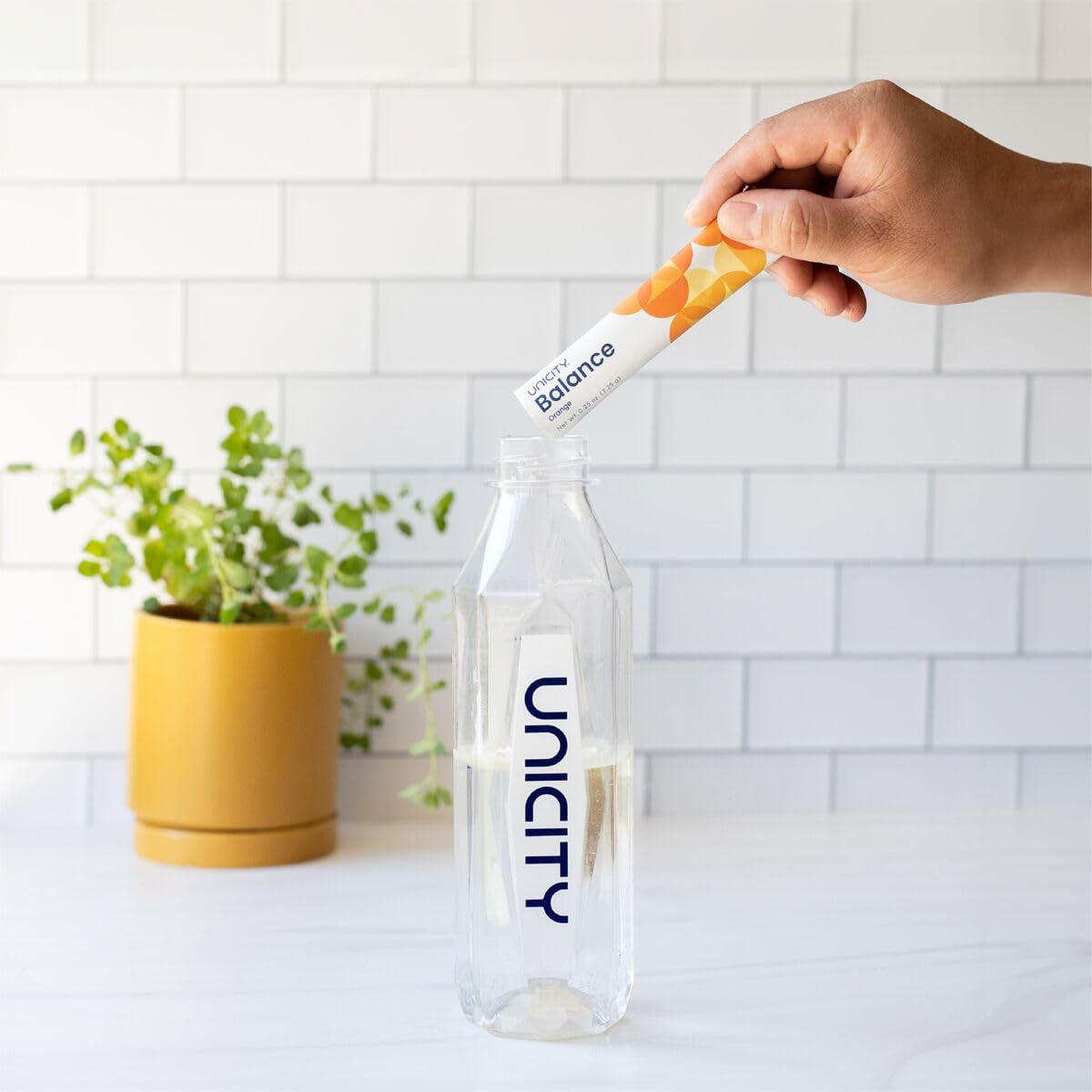Unicity UNIMATE Lemon Ginger sachets for quick, uplifting mornings.