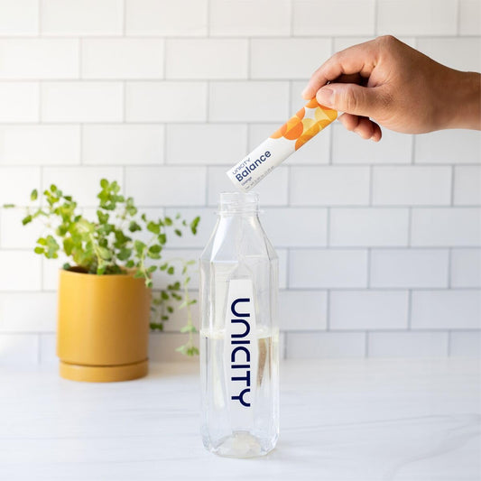 Unicity UNIMATE Lemon Ginger sachets for quick, uplifting mornings.