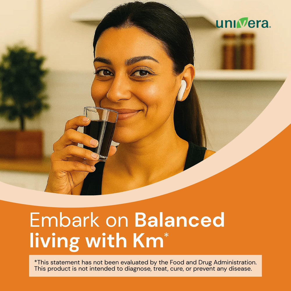 Univera KM bottle back label lists ingredients and usage guidance.
