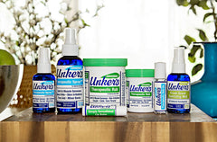 Unkers Therapeutic Salve spread on skin for minor burn and irritation relief.
