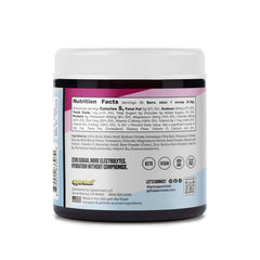 UPPERMOST Hydrate Wild Berry powder dissolving in water for quick electrolyte replenishment after workouts.