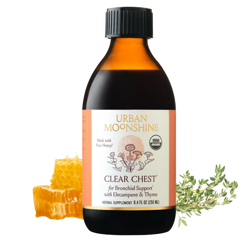 Urban Moonshine Clear Chest Syrup bottle on a wooden surface for respiratory support