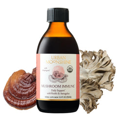 Urban Moonshine Mushroom Immune bottle being poured for daily immune support.