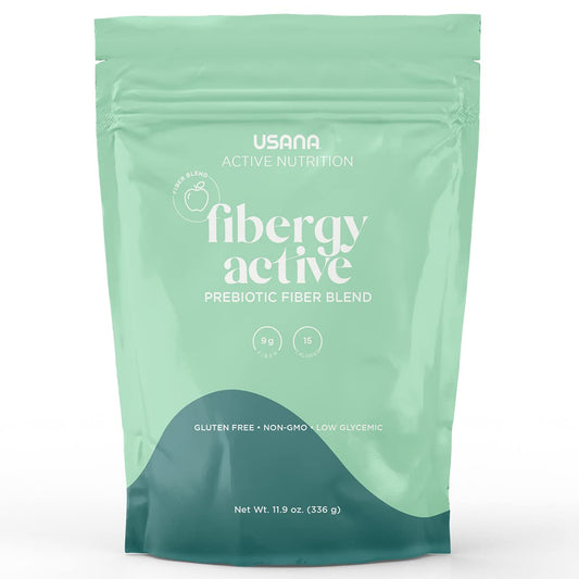 USANA Fibergy Active powder dispensing scene shows easy daily mixing for digestion.