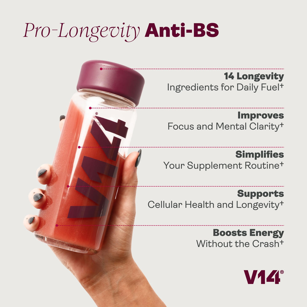 V14 Daily Longevity Reds powder being mixed into a glass for easy daily use.