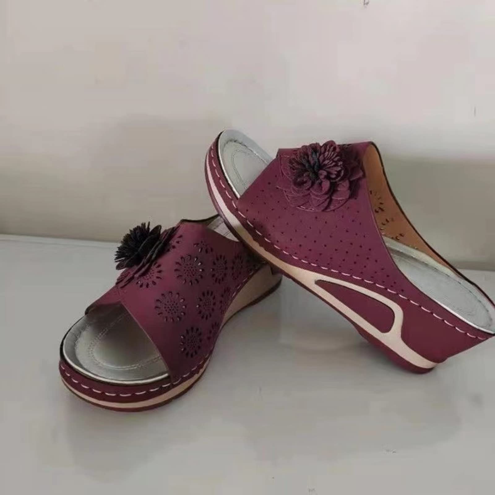 Vannida 3D floral cutout sandal side view in brown pairs with jeans