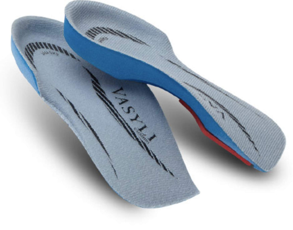 Vasyli Custom Easyfit insoles with lateral cutaway highlight heel stability and biomechanical control.