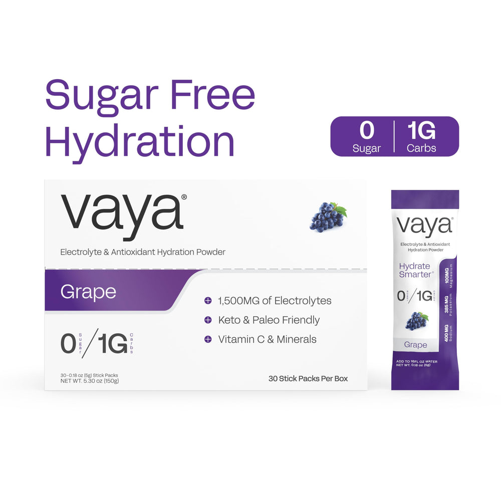Glass of grape electrolyte water prepared with Vaya packets
