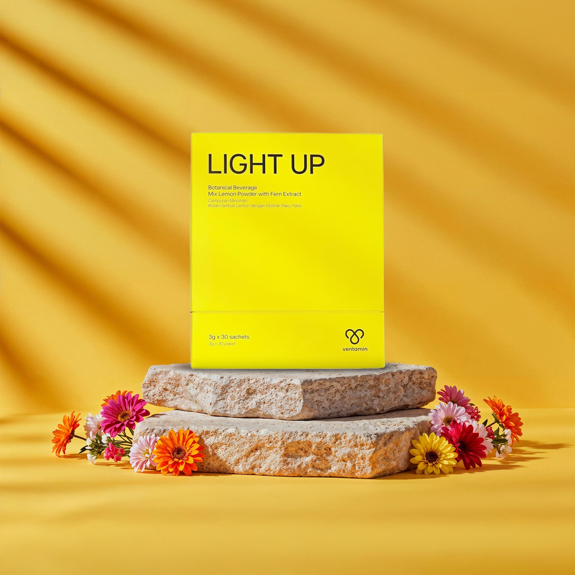 Ventamin Light Up sachet dissolving in water for a refreshing glow.