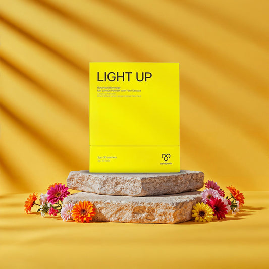 Ventamin Light Up sachet dissolving in water for a refreshing glow.