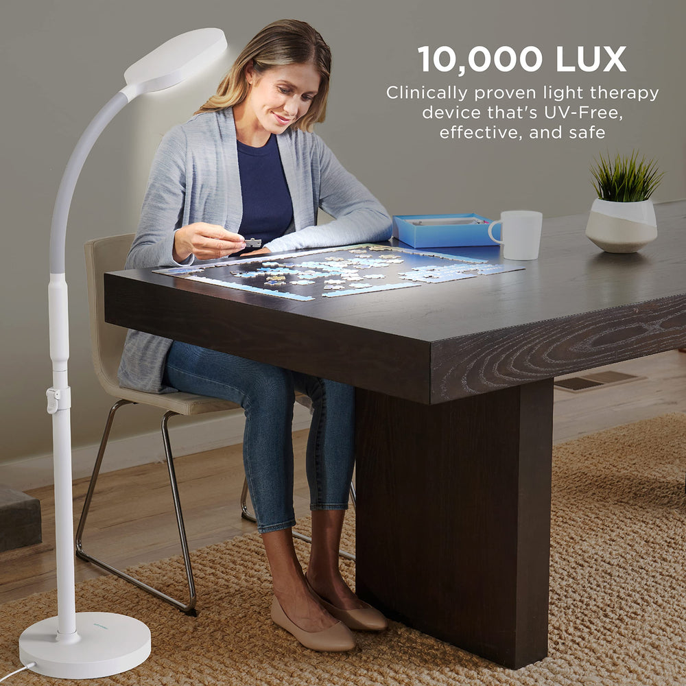 Verilux HappyLight Duo control dials highlight adjustable brightness and color temperature for personalized lighting.