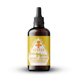 Vesper Gold Metal bottle pour showing cordyceps and lion’s mane for focused energy.