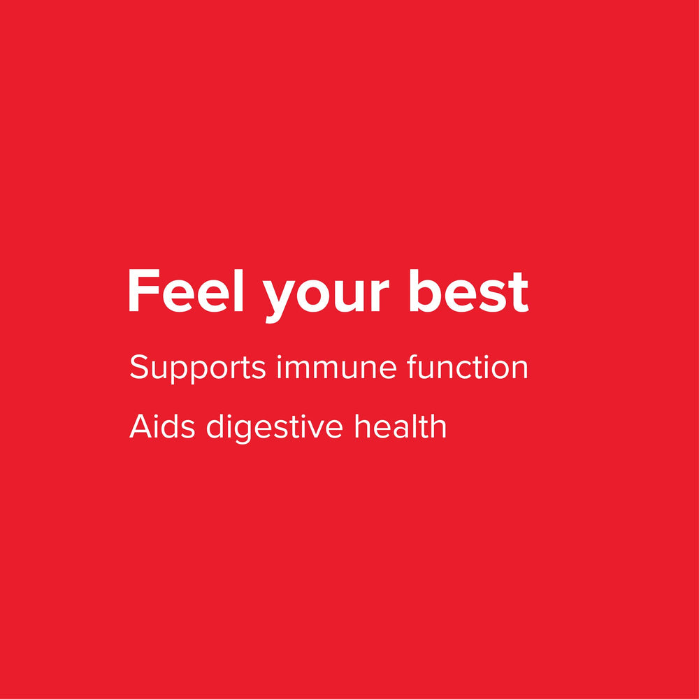 Vibrant Health digestive health scene with capsules and greens representing balanced wellness.