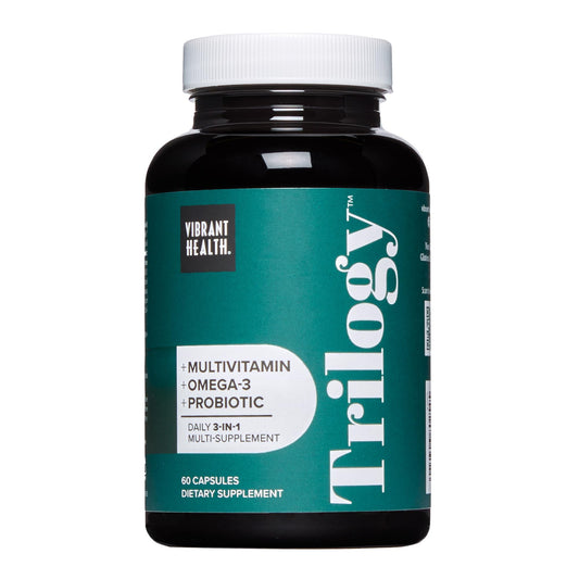 Vibrant Health Trilogy bottle pour showing convenient daily capsule intake