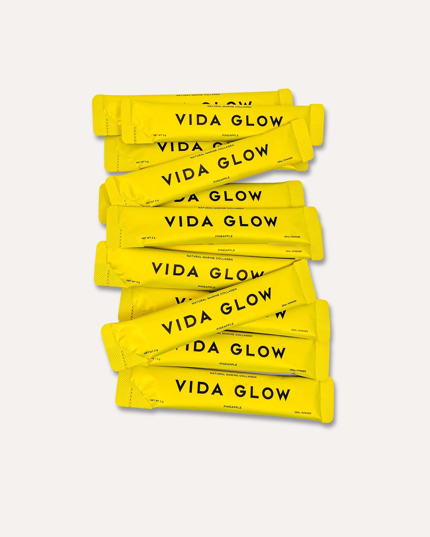 Vida Glow pineapple flavored powder dissolving demonstrates easy mix in water.