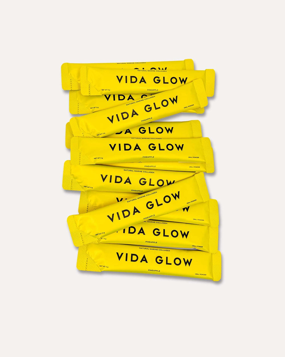 Vida Glow pineapple flavored powder dissolving demonstrates easy mix in water.