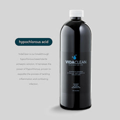 Hands applying VidaClean for gentle cleansing on minor wounds