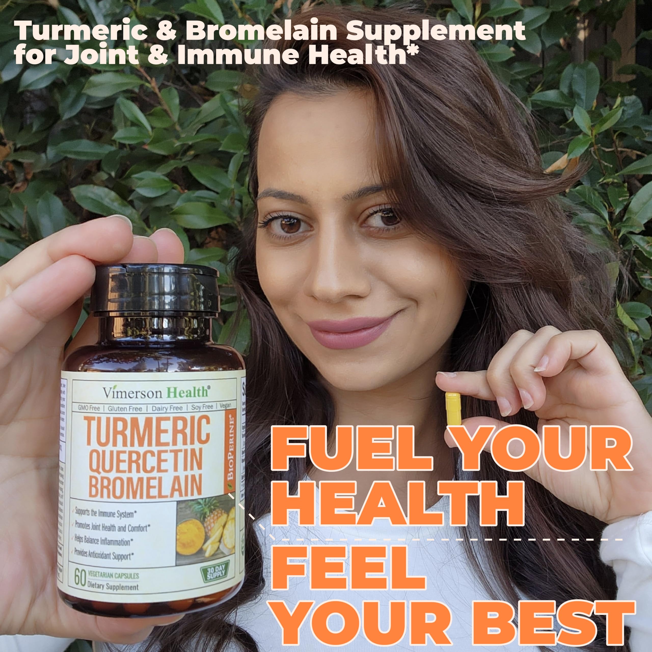 Quercetin with Bromelain Turmeric capsules in a hand with bottle