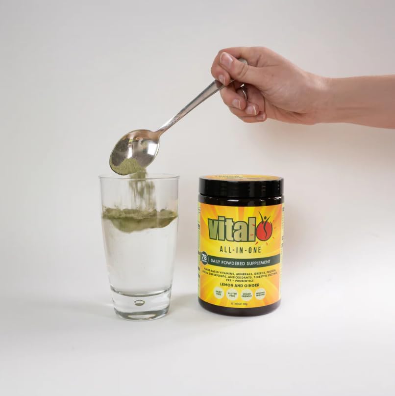 Glass of prepared Vital greens drink after mixing