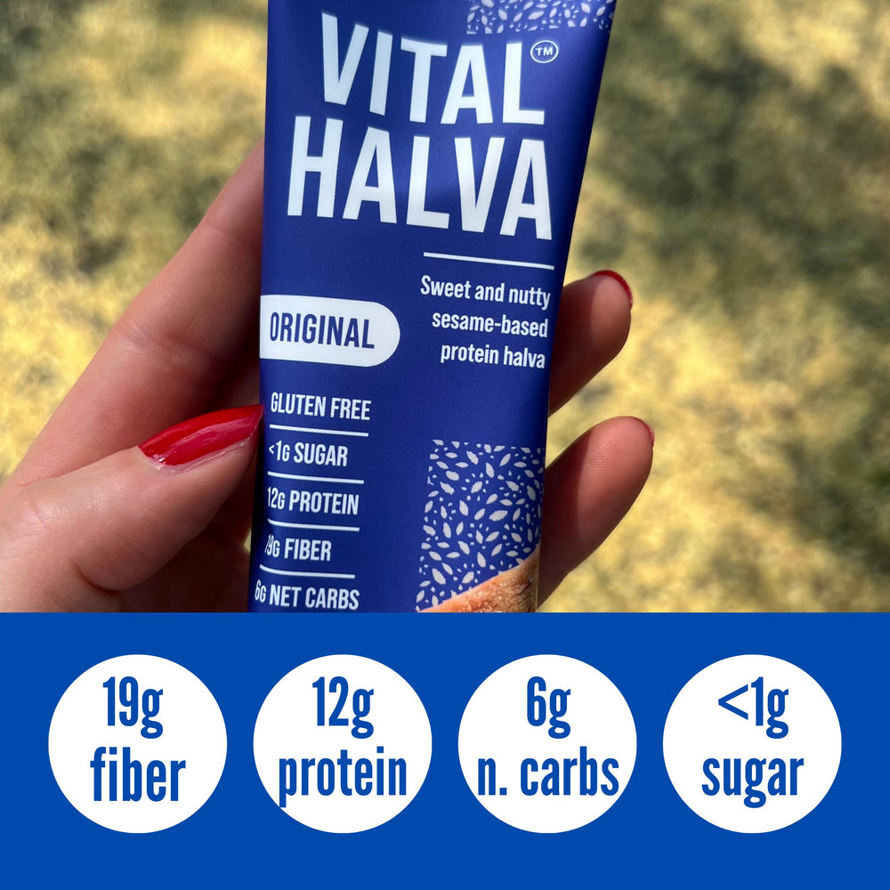 Vital Halva packaging on wooden surface showcases premium sesame snack.