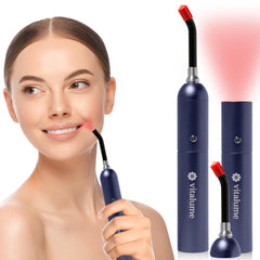 Vitalume red light therapy wand focused on the face for targeted relief and skin support.