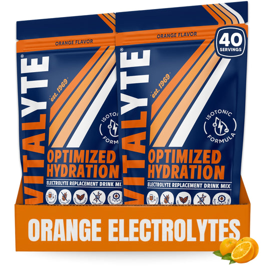 Vitalyte Electrolyte Powder orange pour in a glass for quick hydration