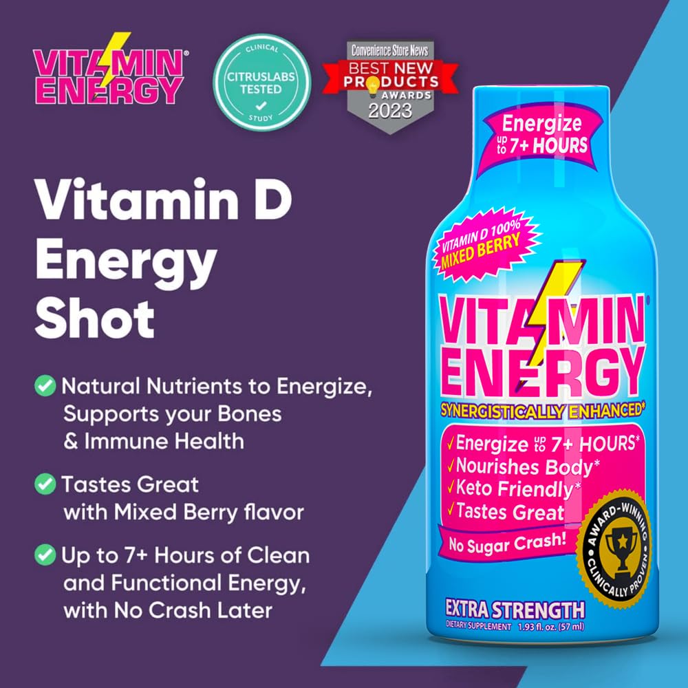 Vitamin Energy berry shot bottle on a desk with notebook.