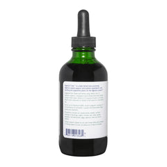 Vitanica Digestion Tonic being poured for convenient digestion support.