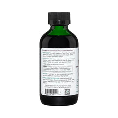 Pour scene of Vitanica Iron Tonic showing convenient daily serving.