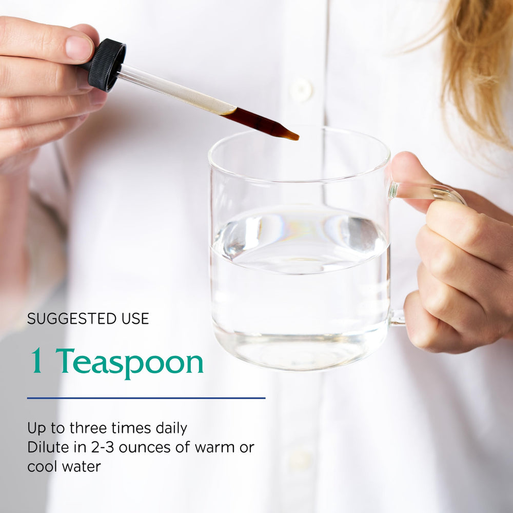 Vitanica Mood Tonic usage setup with glass demonstrating a simple ritual.