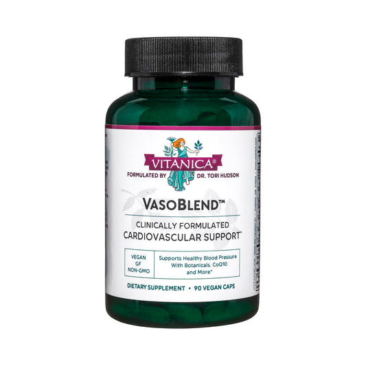 Vitanica VasoBlend bottle on desk suggests daily heart support with herbal blends