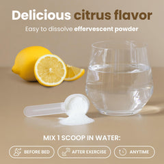 VITASEI Magnesium Total Care citrus flavor dissolving in a glass of water.