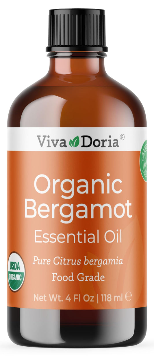 Viva Doria Bergamot oil in an amber bottle ready for aromatherapy sessions.