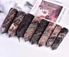 Vizytou Gold Snowflake Obsidian Tower in hand shows portable energy focus.
