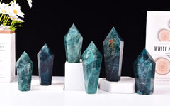 Vizytou green fluorite tower detailed surface catches light for visual interest and chakra-balancing rituals.