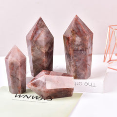 Vizytou hematoid quartz obelisk promotes a calm, tranquil environment.