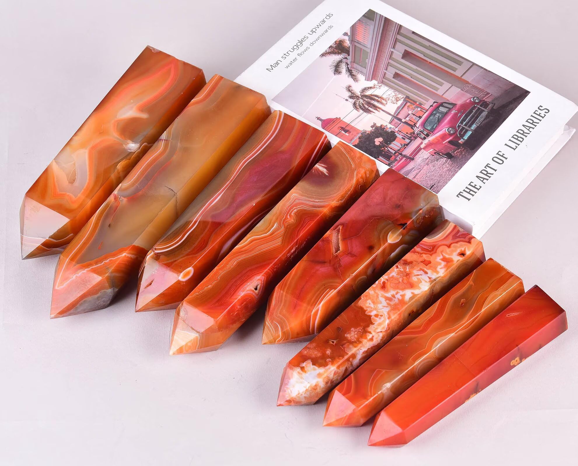 VIZYTOU Red Agate Tower Obelisk used during meditation for grounding focus.