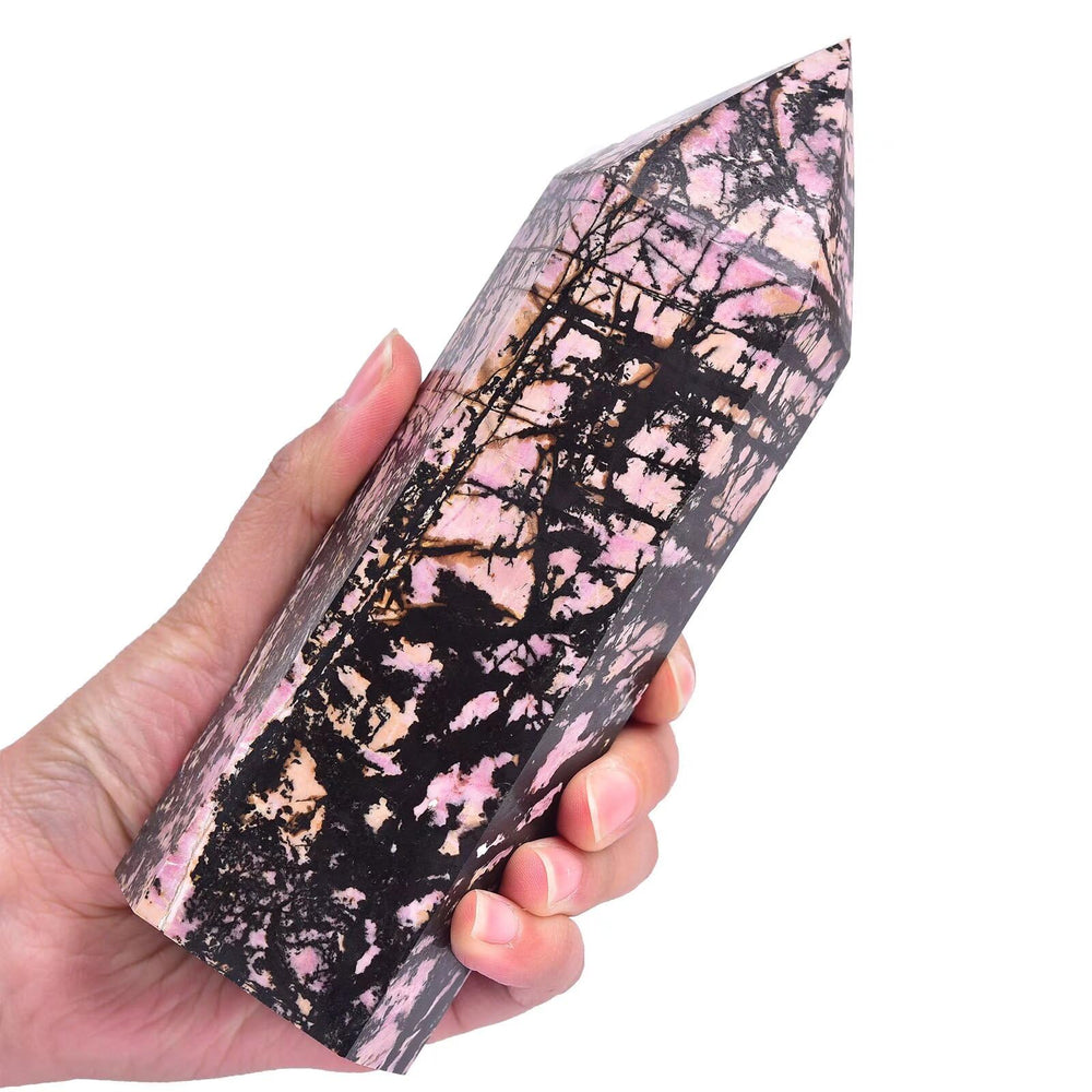 VIZYTOU rhodonite tower obelisk enhances meditation spaces with a serene focal point.