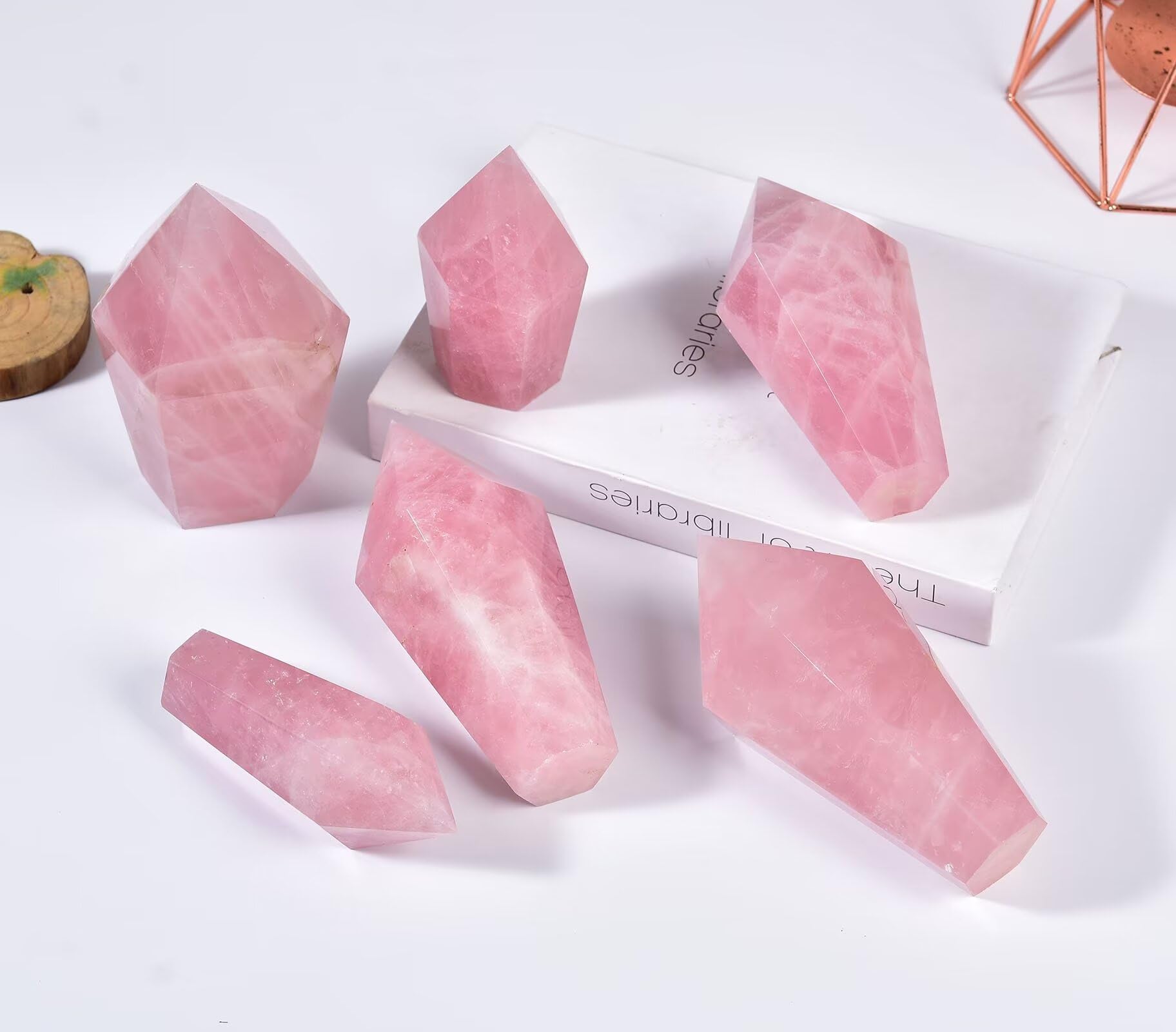 VIZYTOU rose quartz tower displayed on a desk for calm work area.