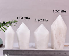 VIZYTOU white crystal obelisk highlighting moon energy for restful ambience
