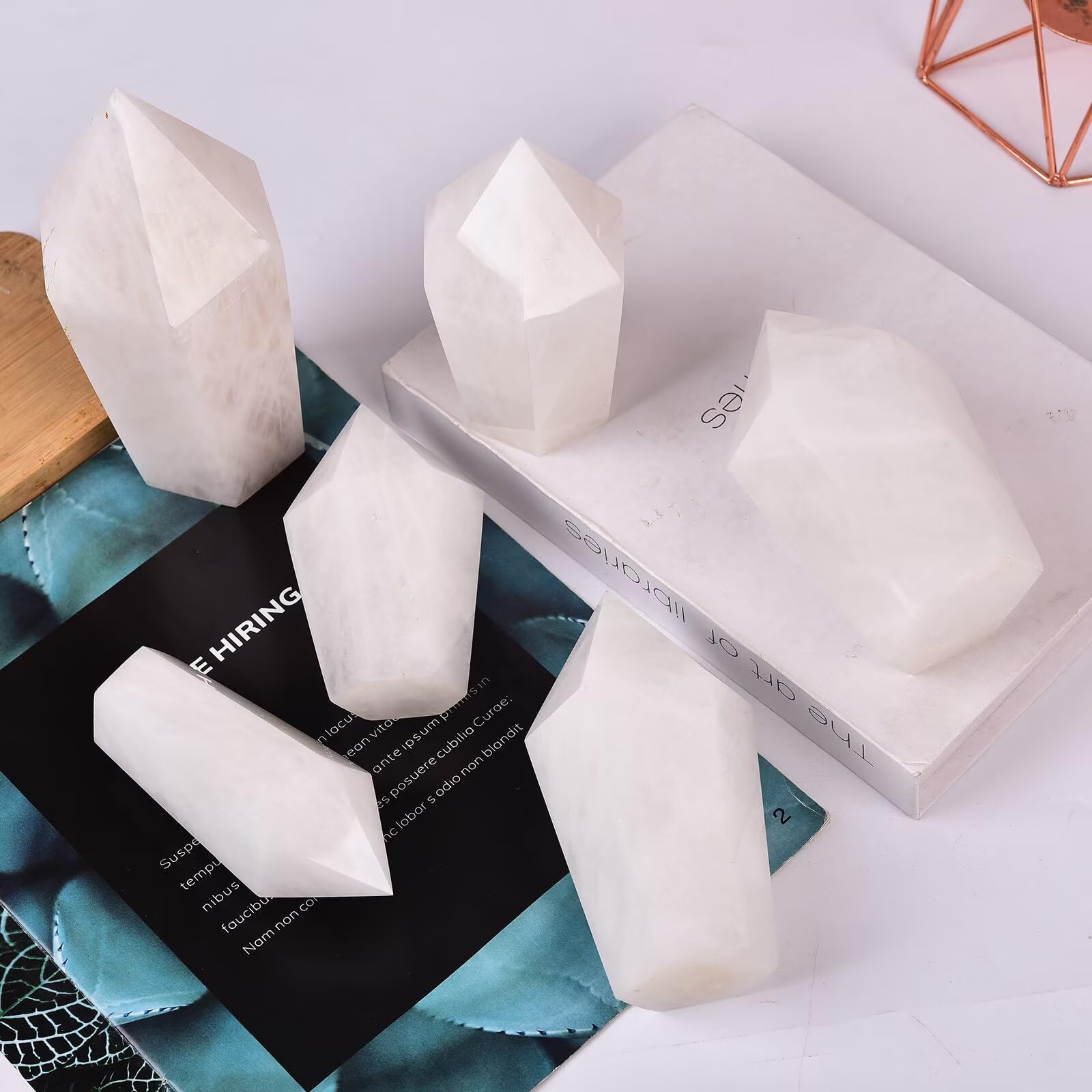 VIZYTOU white crystal tower obelisk catching soft natural light