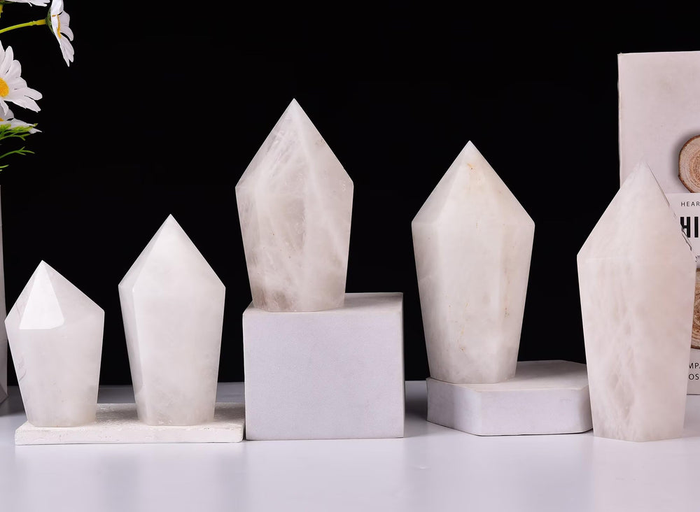 VIZYTOU white crystal tower obelisk displayed with complementary decor