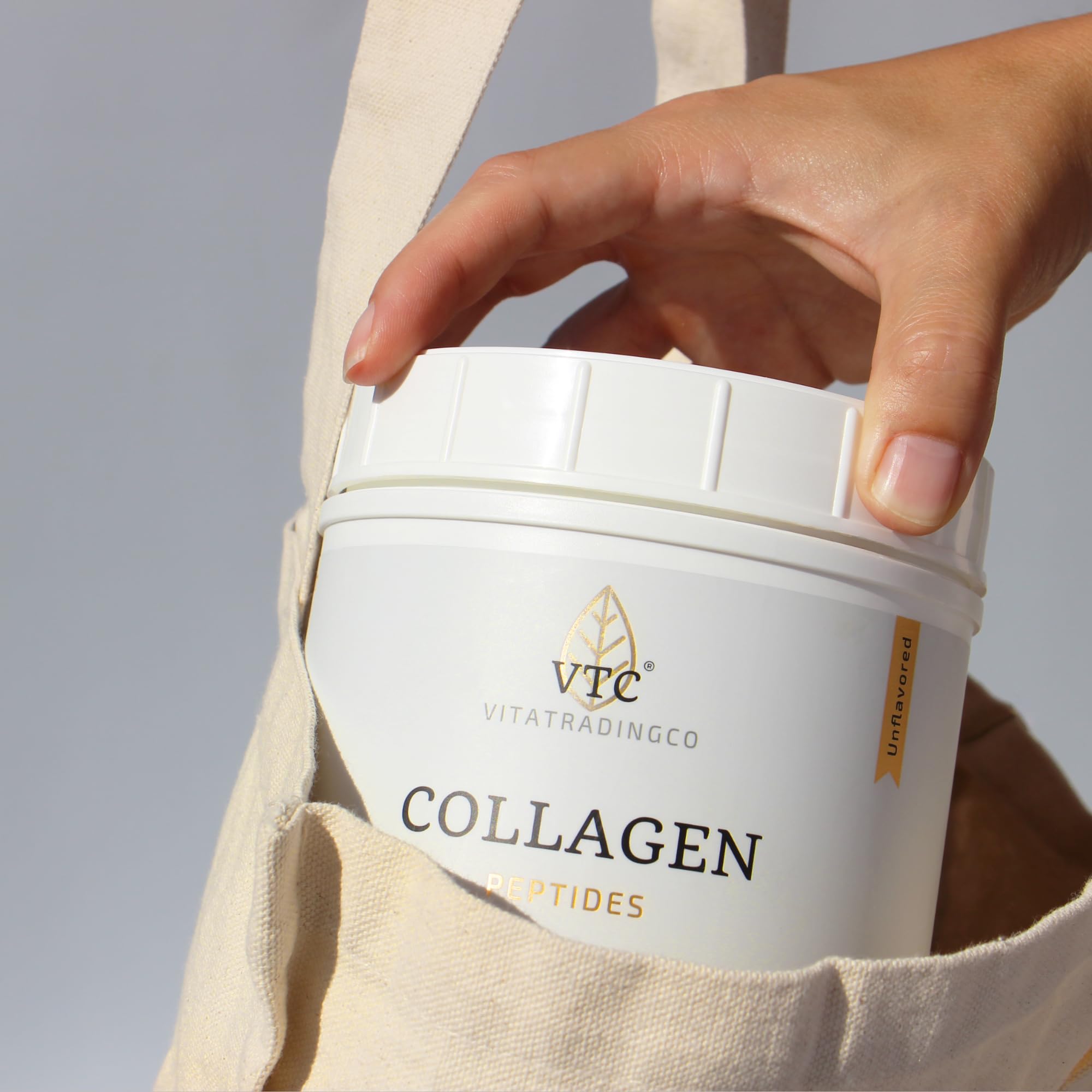 VTC collagen powder poured into coffee for creamy texture.