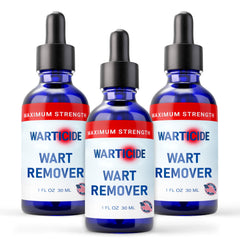 Warticide liquid wart remover dropper applying targeted treatment on skin.