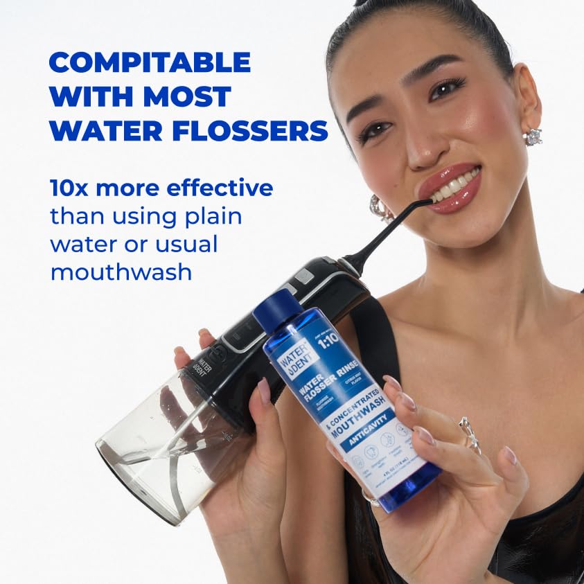 WATER DENT citrus mint rinse beside flossing guide on counter